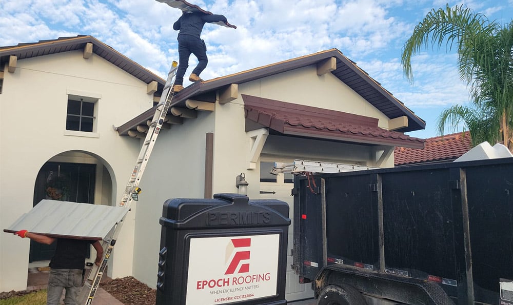 Epoch Roofing workers installing roof.